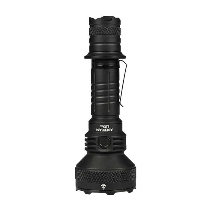 The Acebeam L35 2.0 Tactical Flashlight, equipped with a CREE XHP70.3 HI LED and delivering 5000 lumens of brightness, features a textured grip and clip as it stands upright against a white background.