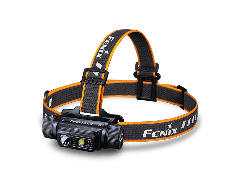 A black and orange Fenix headlamp with an adjustable strap and dual light sources, displayed against a plain white background.