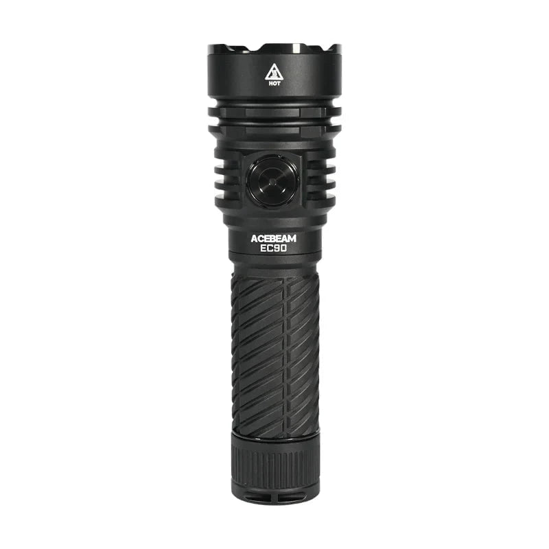 A black Acebeam EC90 EDC flashlight with a textured grip and single front button stands upright on a white background, ready to deliver up to 4300 lumens of powerful illumination.