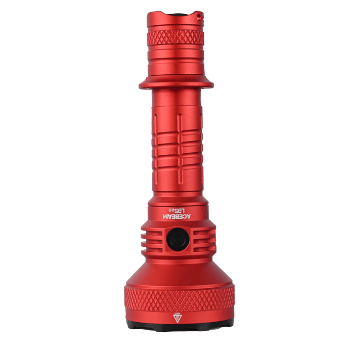The Acebeam L35 2.0 Tactical Flashlight CREE XHP70.3 HI, red and cylindrical with a textured grip and large front lens, delivers 5000 lumens brilliance and stands upright on a white background.