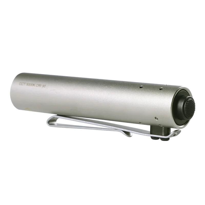 The limited edition Acebeam Rider RX 2.0 ANODIZED Titanium flashlight features a cylindrical design with a black button on one end, a metal clip along its side, and the high-performance Nichia 519A LED for exceptional illumination.