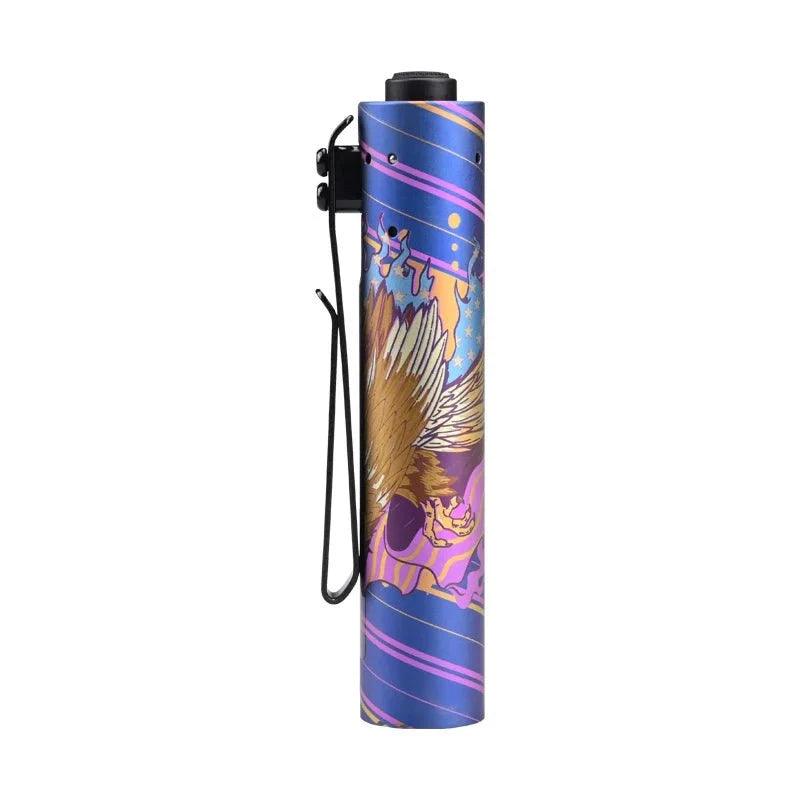 A cylindrical, blue Acebeam Rider RX 2.0 ANODIZED Titanium (Limited Edition) flashlight with a vivid multicolored design and black wrist strap, featuring a Nichia 519A LED, photographed against a white background.