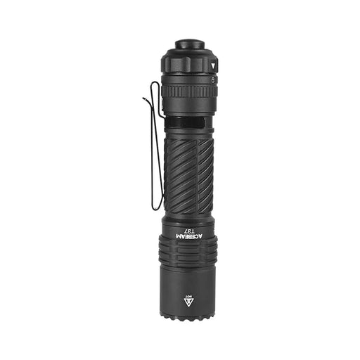 The Acebeam T37, a black compact high-lumen tactical flashlight with a textured grip, side clip, and tail button, is shown against a white background.