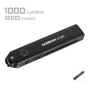The Acebeam UC20 multifunctional flashlight, in black, features a powerful 1000 lumens output and 12,100 candela against a white background.