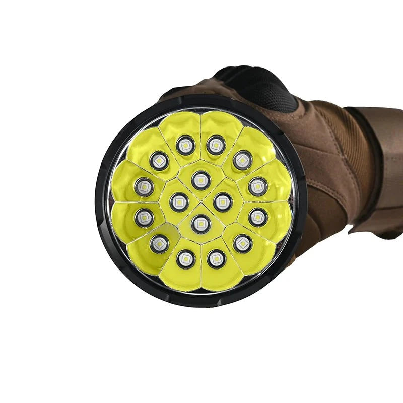 A close-up shows a gloved hand holding the Acebeam X25, a high power flashlight featuring multiple LED bulbs arranged in a circular pattern.