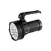 The Acebeam X25 is a black handheld high-power flashlight with a ribbed grip, top handle, and multiple LED bulbs in the reflective lens for intense illumination.