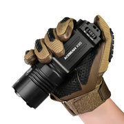 A gloved hand holds an Acebeam X30, a 20,000-lumen dual-source searching flashlight, against a white background.