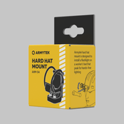 The Armytek Hard Hat Mount AHM-04 comes in yellow and black box packaging with product illustration and description, designed for attaching a hands-free headlamp to a hard hat.
