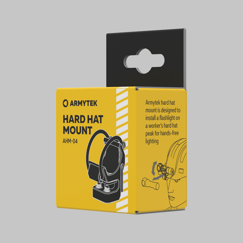 The Armytek Hard Hat Mount AHM-04 comes in yellow and black box packaging with product illustration and description, designed for attaching a hands-free headlamp to a hard hat.