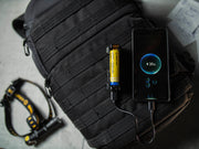 Armytek Handy C1 Pro charging a phone in power bank mode