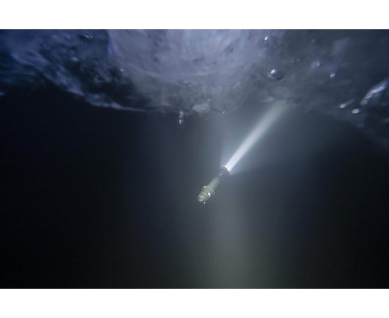 The Armytek Dobermann Pro Max tactical flashlight delivers a bright, powerful beam underwater and on land, ensuring excellent illumination in dark environments.