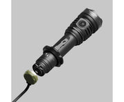 The Armytek Predator Pro Max, a black military-grade flashlight with a side button and attached pressure switch, is shown against a plain gray background.