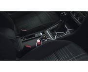 A car with an Armytek Prime C1 Pro Magnet USB in the center console.