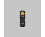 An Armytek Prime C1 Pro Magnet USB with a yellow button on a gray background.