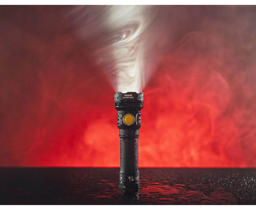 An Armytek Prime C2 Pro Max Magnet USB with smoke coming out of it.