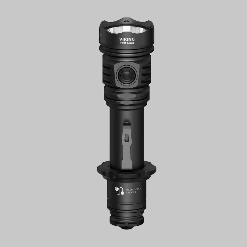The Armytek Viking Pro Max Magnet USB - White flashlight, featuring a power button and magnetic USB charging port, is displayed upright on a gray background.