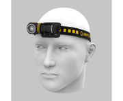 The Armytek Elf C1 USB-C White is demonstrated on a white mannequin head, featuring its 1000 lumens light positioned on the left side of the black and yellow adjustable strap. This versatile flashlight includes a USB-C charger for added convenience.