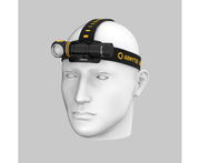 A mannequin head displays the stylish Armytek Elf C2 USB-C Warm headlamp, highlighting its warm yellow accents and a handy USB-C charging port, set against a subtle gray background.