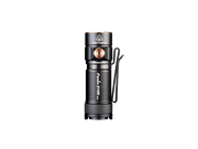 The Fenix E18R V2 is a sleek, black everyday carry (EDC) flashlight featuring a clip and metallic accents, shining brightly against a black background. This rechargeable LED flashlight offers 1200 lumens in a compact design, making it ideal for any adventure.