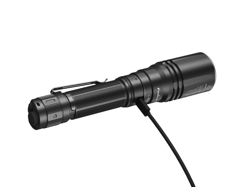 The Fenix HT30R flashlight comes with a textured grip and metal clip and can be charged with a USB-C cable, offering precise distance illumination.