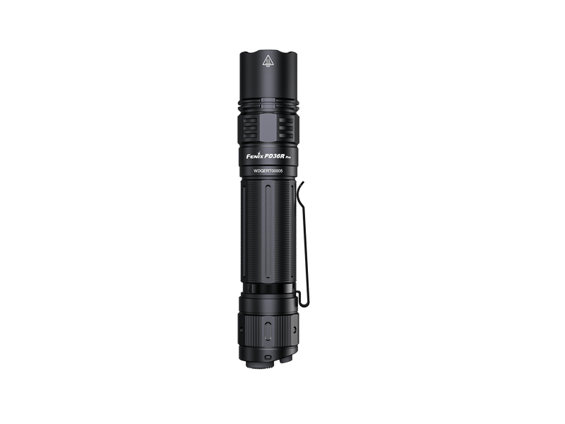 The Fenix PD36R Pro tactical flashlight, featuring a textured grip and a pocket clip, is displayed standing upright against a simple backdrop, offering an impressive 2800 lumens.