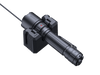 The Fenix WF26R, a black LED work flashlight, is positioned on a charging cradle with a wired connection. The dock features side grips and includes a small indicator light.