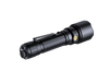 The Fenix WF26R, a black tactical flashlight producing 3000 lumens, features a textured grip and an end button, elegantly displayed on a black background.