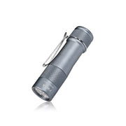 The Lumintop FWAA is a compact, metallic gray EDC flashlight with a pocket clip, shown angled on white. It delivers up to 1600 lumens—ideal for everyday carry.