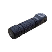 The Manker E03H III, a black handheld flashlight featuring a textured grip and a circular LED light at the front, boasting 1200 lumens of brightness, is positioned against a white background.