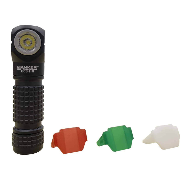 A black Manker E03H III premium everyday carry angle flashlight is shown standing upright next to three interchangeable colored filters: red, green, and white. With its 1200 lumens output, this versatile tool promises unparalleled illumination for any situation.