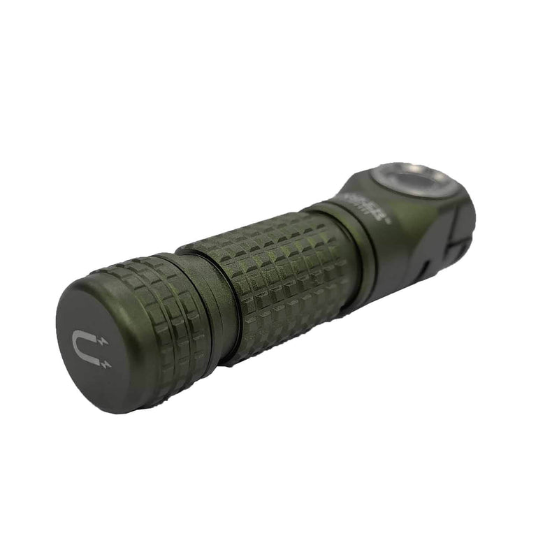 The Manker E03H III, a green, compact everyday carry flashlight with a textured grip and a magnetic base, is capable of producing 1200 lumens and is positioned horizontally against a white background.