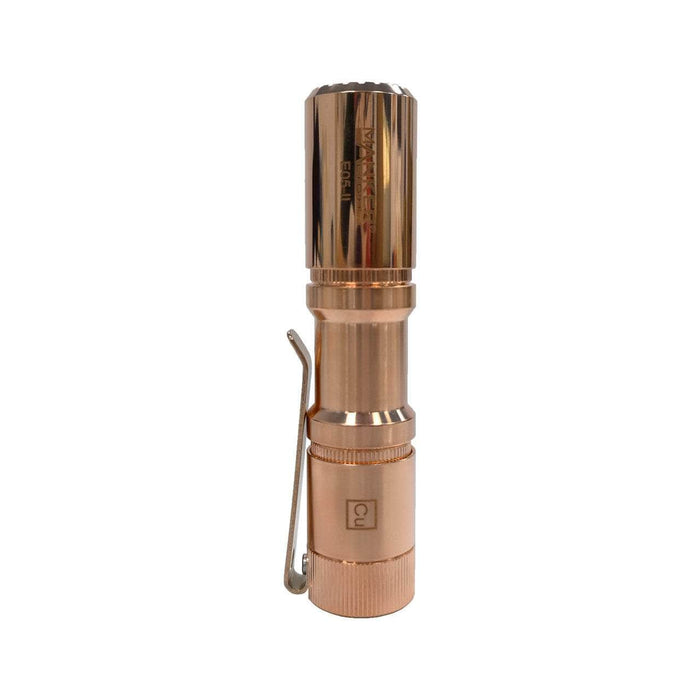A compact copper colored flashlight, the Manker E05 II - Copper, showcased on a white background.