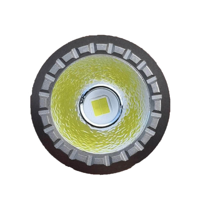 A yellow led light bulb with a white background. This Manker E05 II Ti titanium flashlight emits 1300 lumens.