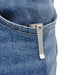 The pocket of a pair of jeans with a Manker E05 II Ti flashlight.