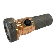 A compact LED flashlight with a bronze-colored body, black power button, and textured grip, the Manker MC13 II Pocket EDC Flashlight - Titanium & Copper combines functionality with style.