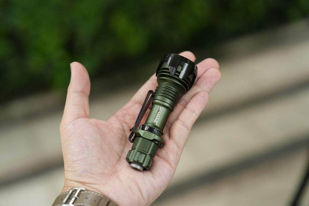 A person holding a Manker Striker Mini in their hand.