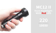 A hand holds a black flashlight. Text next to the flashlight reads, "Mankerlight MC12 II Hunter Flashlight with Red LED, 220 Max. Lumens, Rechargeable Lithium Ion Battery, USB Type-C Charging.
