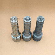 Angled view of ReyLight Dawn Max titanium tail switches in three finishes