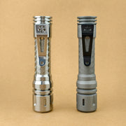 Rear view of Raw and Stonewashed ReyLight LAN Seigaiha titanium flashlights showing pocket clips