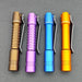 Four ReyLight Pineapple Mini MK II flashlights in brown, purple, blue, and orange with pocket clips are lined up on a gray background. They feature advanced Nichia 519a LEDs for superior illumination.