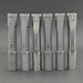 Six silver metal flashlights with clip attachments, including the ReyLight Pineapple Mini Ti - MK II featuring a Nichia 519a R9080 LED, are lined up vertically against a gray background.