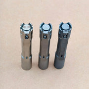 Angled view of Pineapple Mini MK3 Cross Hatch tail buttons and CNC titanium pocket clips