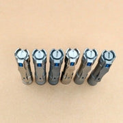 Six metallic flashlights, including the ReyLight Pineapple Mini Titanium - MK3 with a high-CRI LED, stand upright in a row on a light brown surface—perfect for your everyday carry collection.