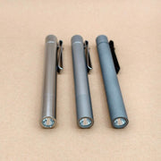 ReyLight Cylinder penlights lying side by side with their reflector openings facing forward