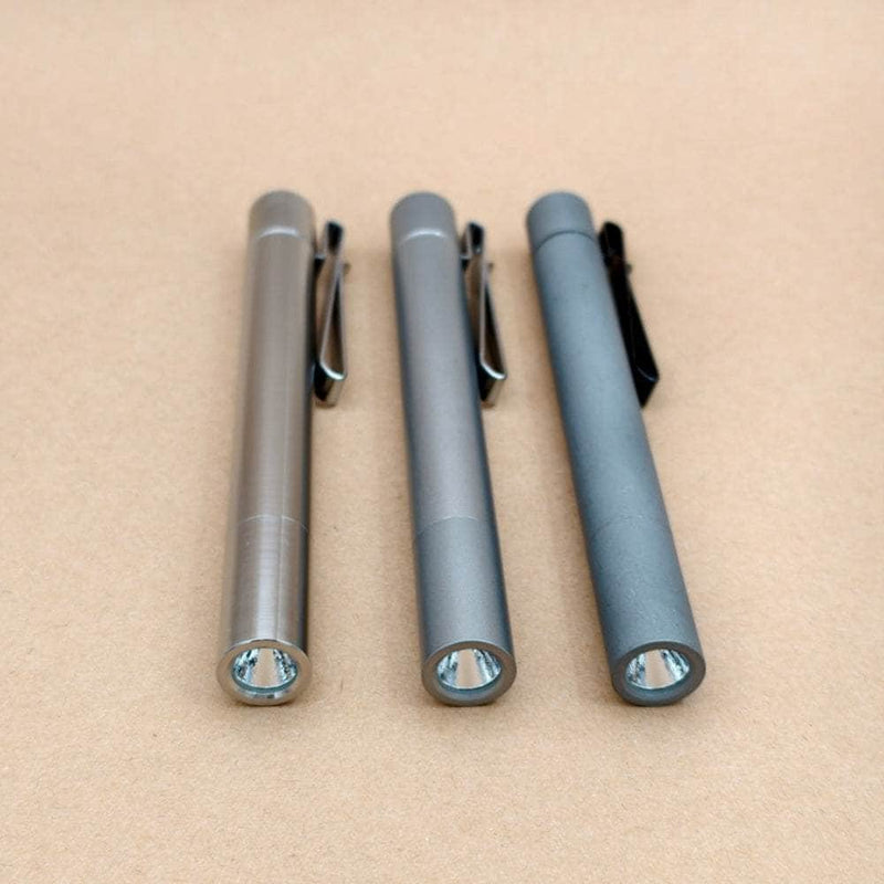 ReyLight Cylinder penlights lying side by side with their reflector openings facing forward