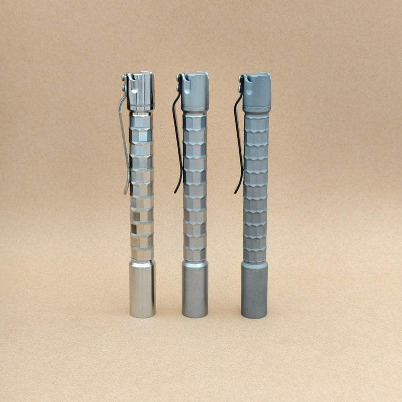 Side profile of the ReyLight Krystal penlights showing the geometric body machining
