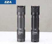 Gun metal gray and black Skilhunt E2A flashlights standing side by side