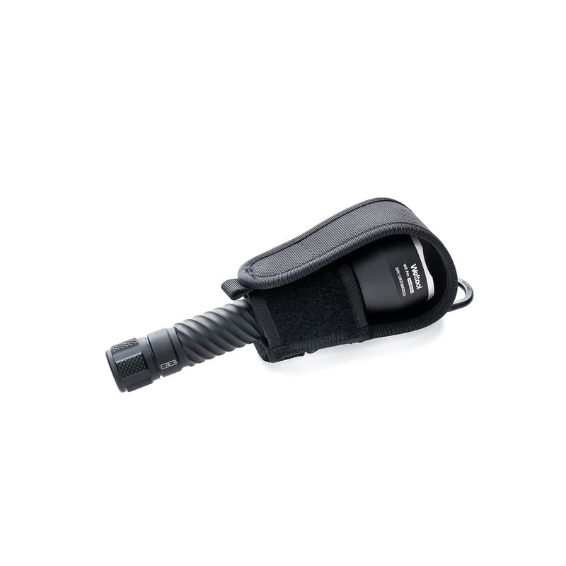 A black handheld flashlight with textured grip, partially enclosed in a Weltool FH6 V2.0 Semi-closed Nylon Flashlight Holster for W4Pro,W5Pro, featuring a Velcro flap.
