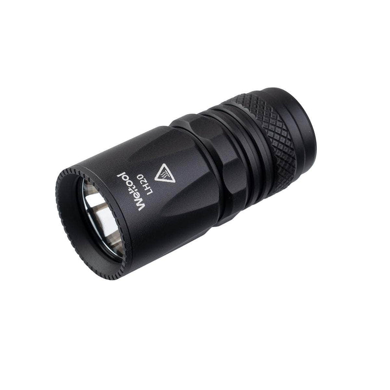 The Weltool LH20 is a compact black flashlight with a textured grip and metallic lens, featuring an aluminum reflector for enhanced brightness, shown at an angle on a white background.