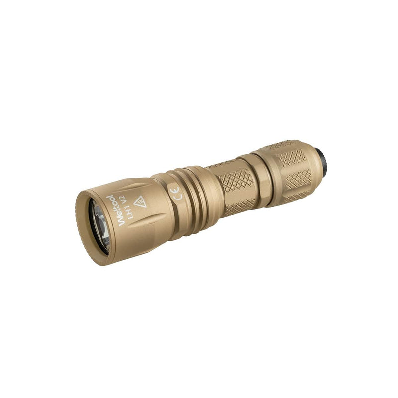 The Weltool T16A is a tan, compact long-throw LED tactical flashlight with a textured grip and a tailcap power button, offering a high-candela beam for impressive distance, shown on a white background.